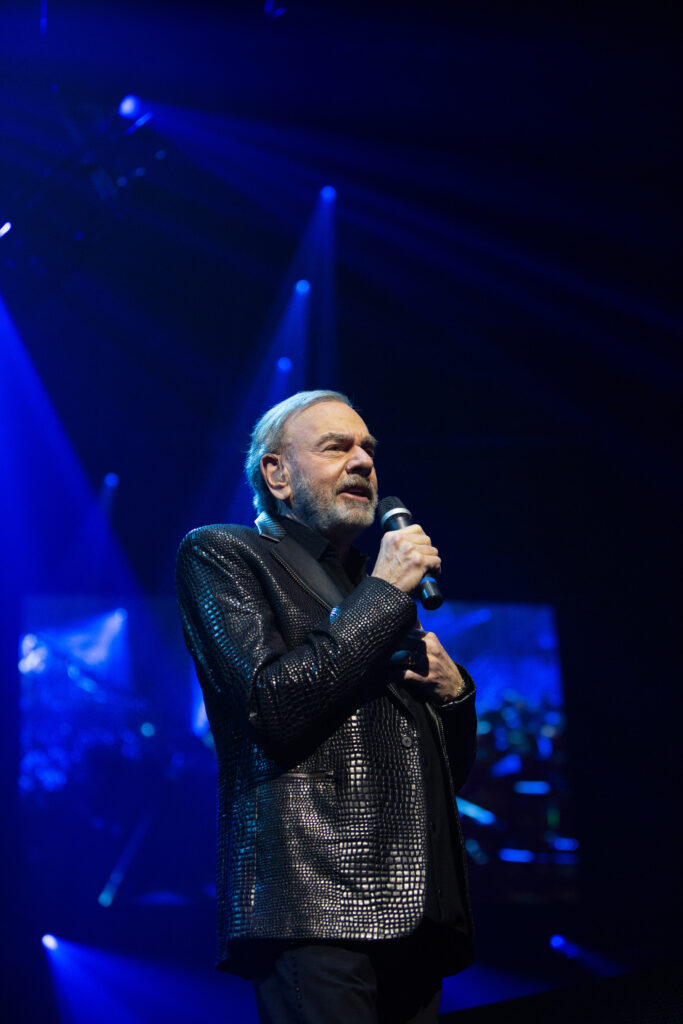 Neil Diamond returns to the stage to belt out hits at Las Vegas charity gala two years after announcing retirement